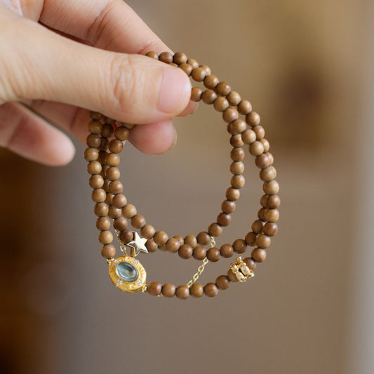 Sandalwood Beads aquamarine Enchanted Serenity Bracelet