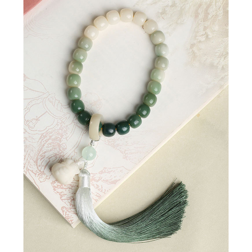 Natural Gradient Bodhi Seed Fortune Money Bag Lotus Wisdom Tassel Wrist Mala - Fortune & Karma