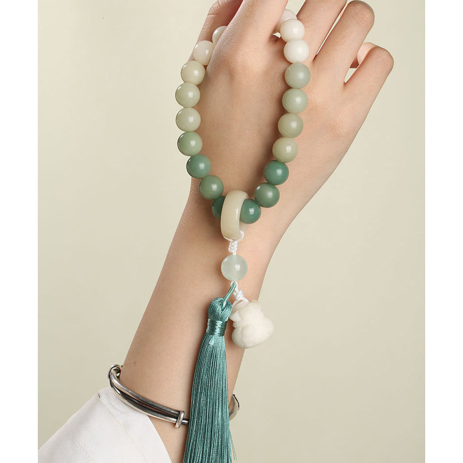 Natural Gradient Bodhi Seed Fortune Money Bag Lotus Wisdom Tassel Wrist Mala - Fortune & Karma