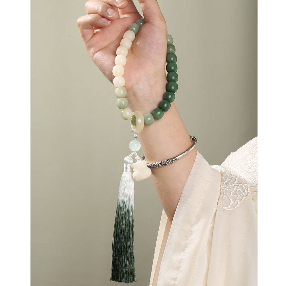 Natural Gradient Bodhi Seed Fortune Money Bag Lotus Wisdom Tassel Wrist Mala - Fortune & Karma