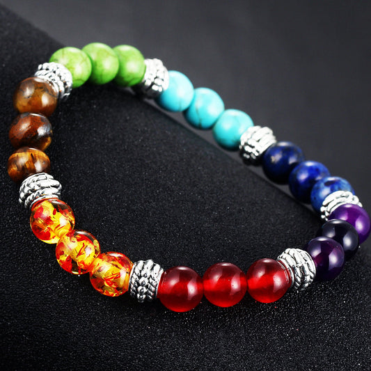 7 Chakra Stone Bracelet with seven colored natural stone beads on an elastic strand