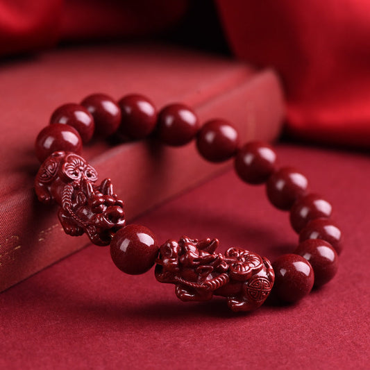 Cinnabar Pixiu blessing bead bracelet in vivid vermilion red, symbolizing protection and good fortune in feng shui tradition