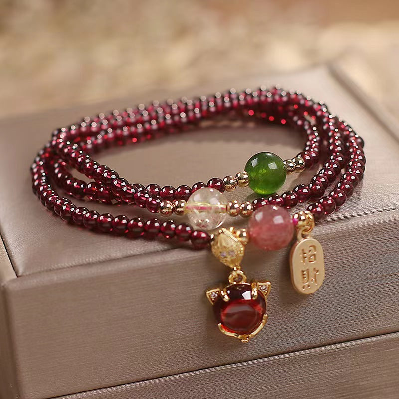 Natural garnet and strawberry quartz triple wrap bracelet with peace buckle