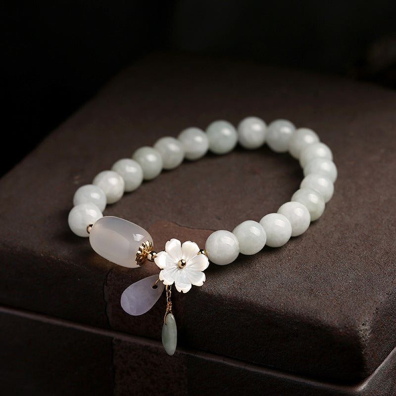 Natural white jade bead luck bracelet from Fortune & Karma